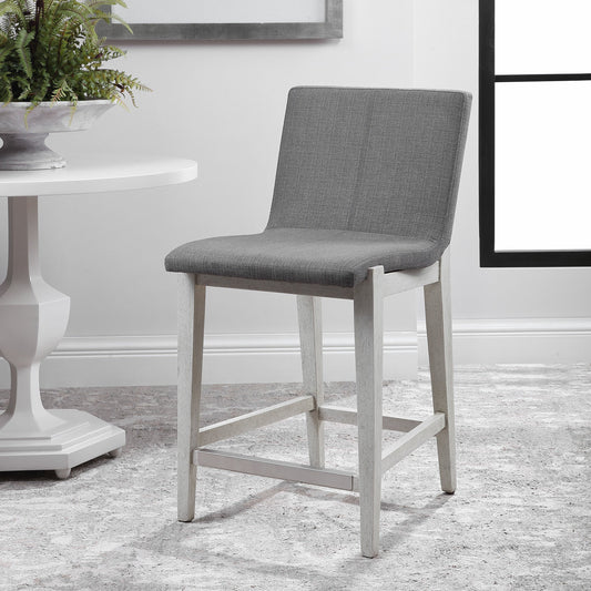 Brazos Counter Stool by Uttermost in gray. Made from rubber wood, plywood, fabric, foam in a modern style.