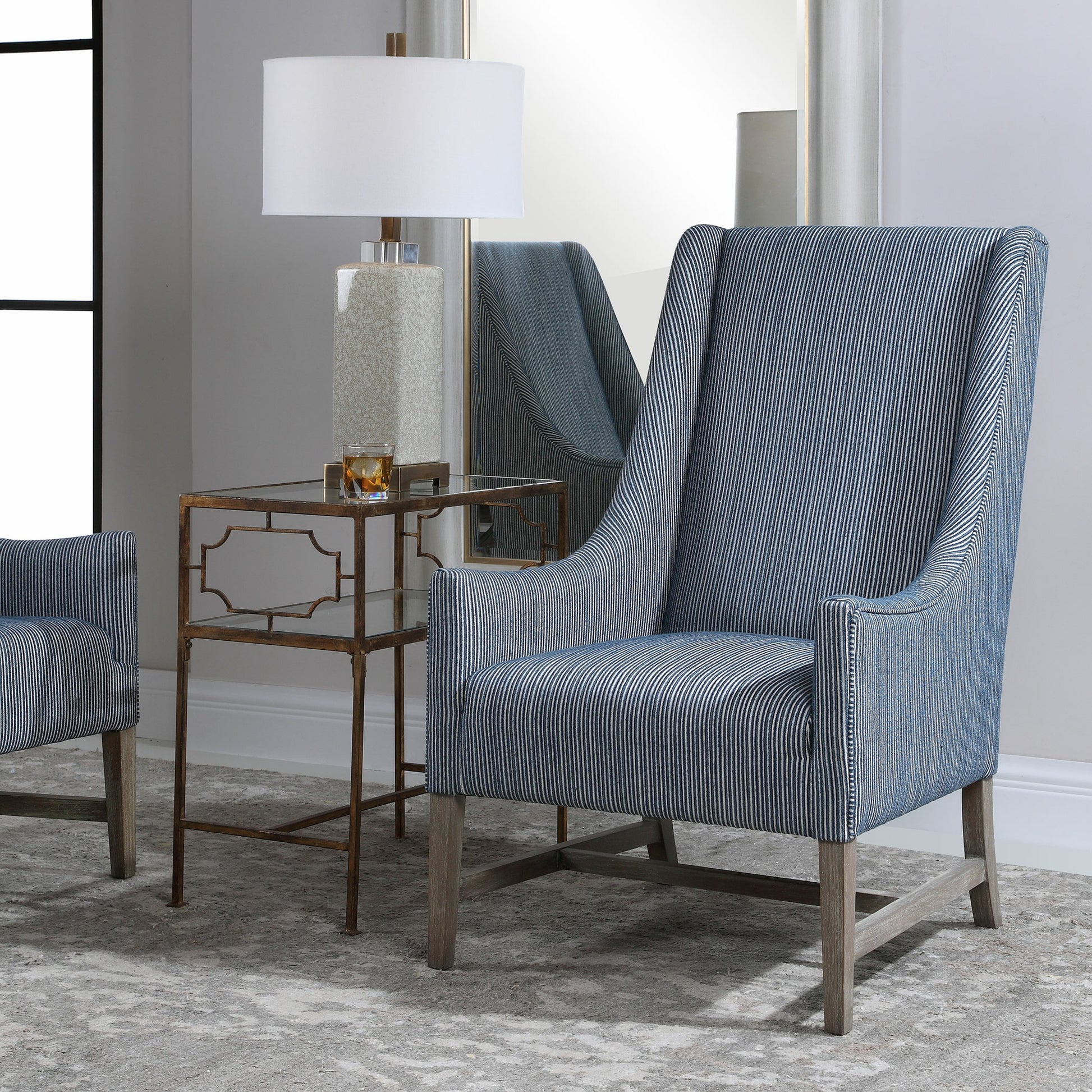 Galiot Wingback Accent Chair by Uttermost. Made from rubber wood, eucalyptus, fabric, foam, plywood in a modern style.