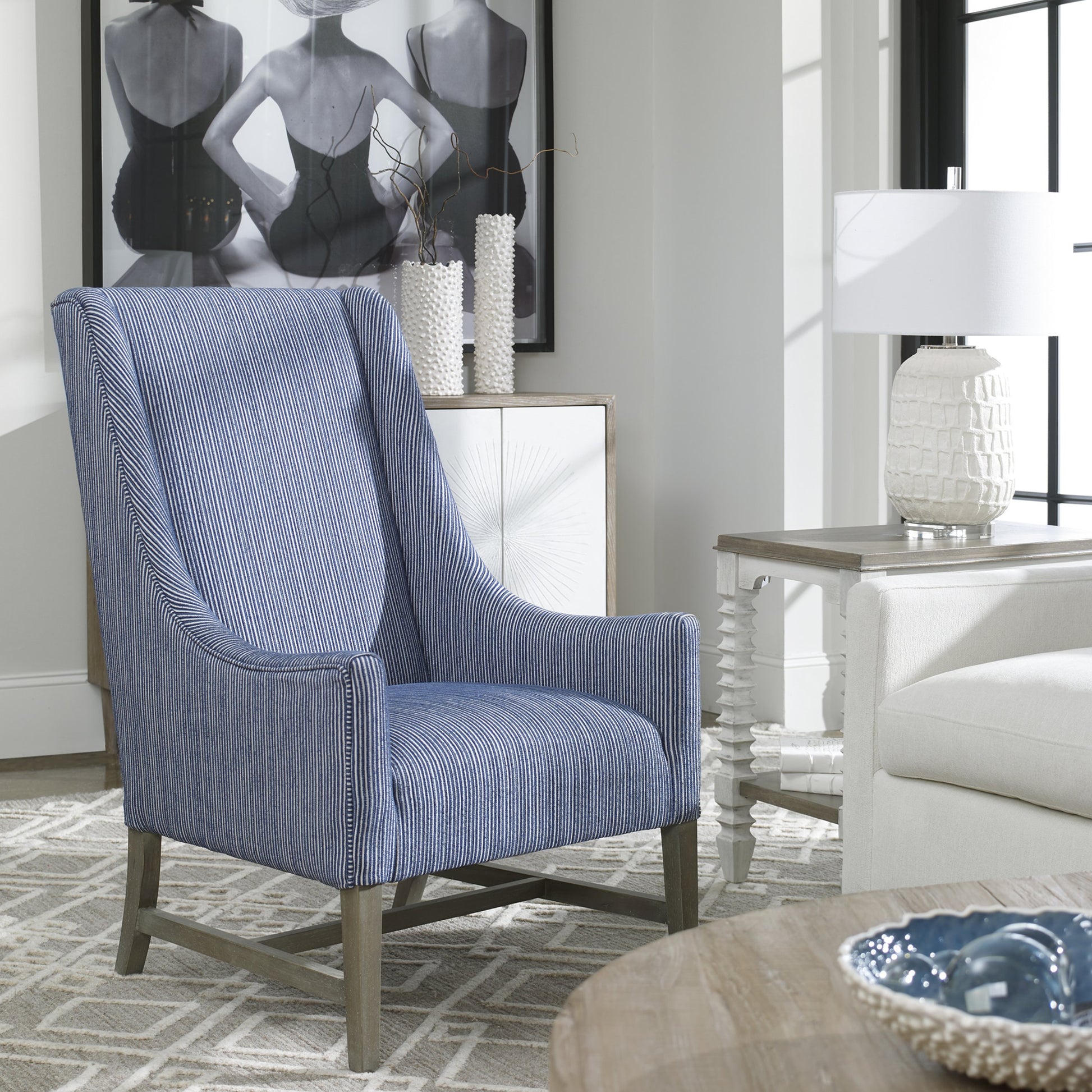 Galiot Wingback Accent Chair by Uttermost. Made from rubber wood, eucalyptus, fabric, foam, plywood in a modern style.