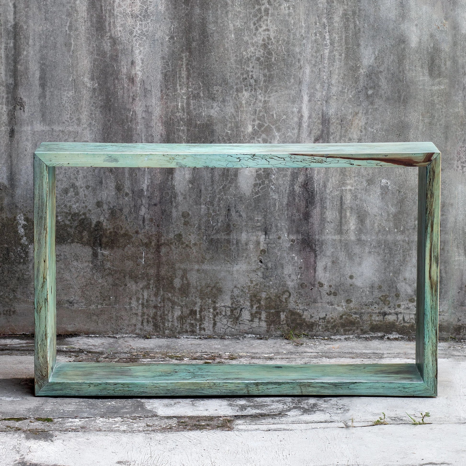 Teo Console Table by Uttermost in caribbean blue green. Made from solid wood in a eclectic & global style.
