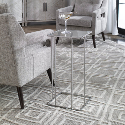 Cadmus Accent Table by Uttermost in black. Made from iron, glass in a modern style.