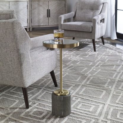 Laurier Accent Table by Uttermost in brass. Made from 50% iron, 15% glass, 10% faux ful, 25% pine wood in a transitional style.
