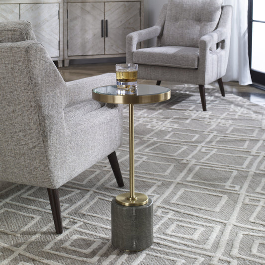 Laurier Accent Table by Uttermost in brass. Made from 50% iron, 15% glass, 10% faux ful, 25% pine wood in a transitional style.