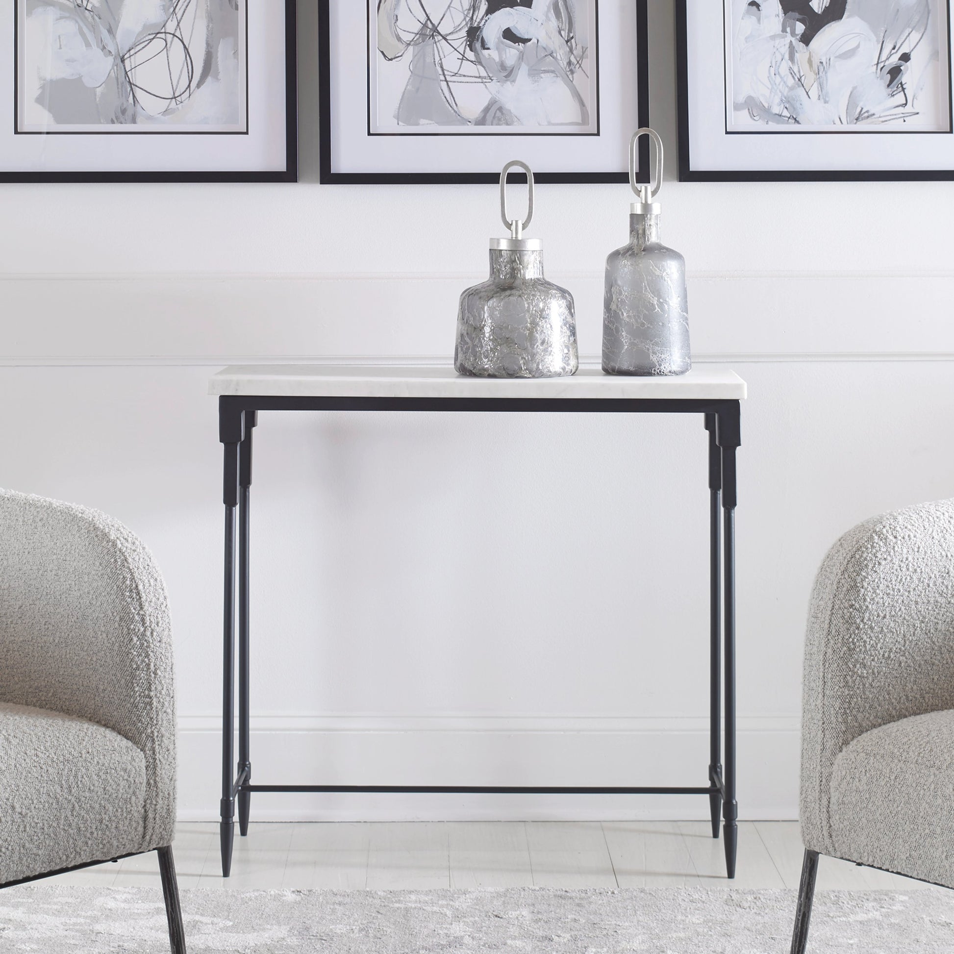 Bourges Console Table by Uttermost in white, satin black. Made from marble, iron in a transitional style.