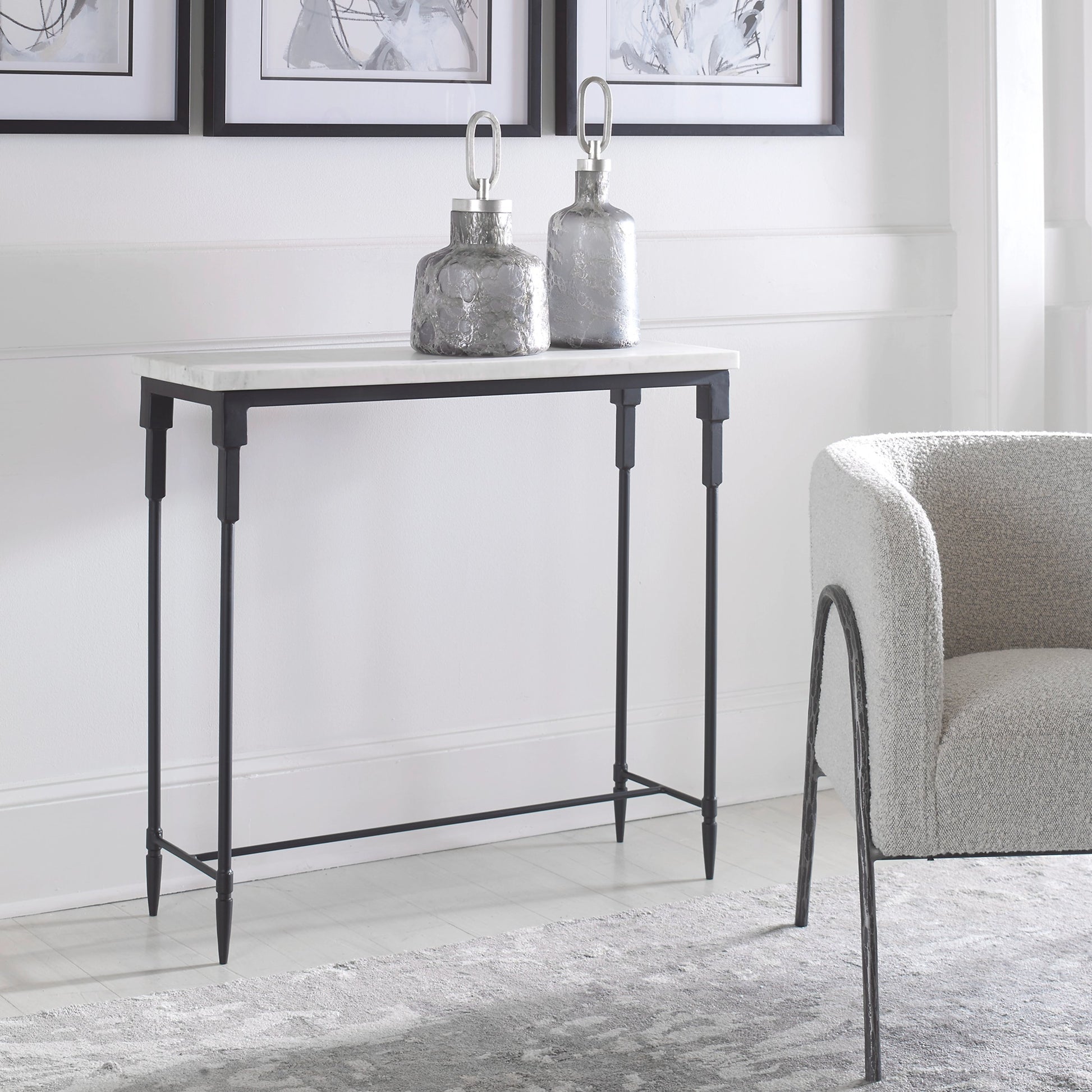 Bourges Console Table by Uttermost in white, satin black. Made from marble, iron in a transitional style.