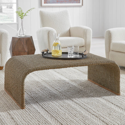 Calabria Coffee Table by Uttermost in woven seagrass. Made from woven seagrass, mango wood, metal in a coastal style.