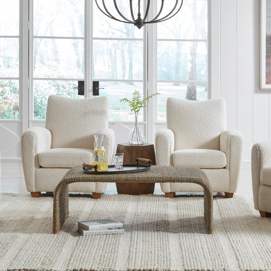 Calabria Coffee Table by Uttermost in woven seagrass. Made from woven seagrass, mango wood, metal in a coastal style.