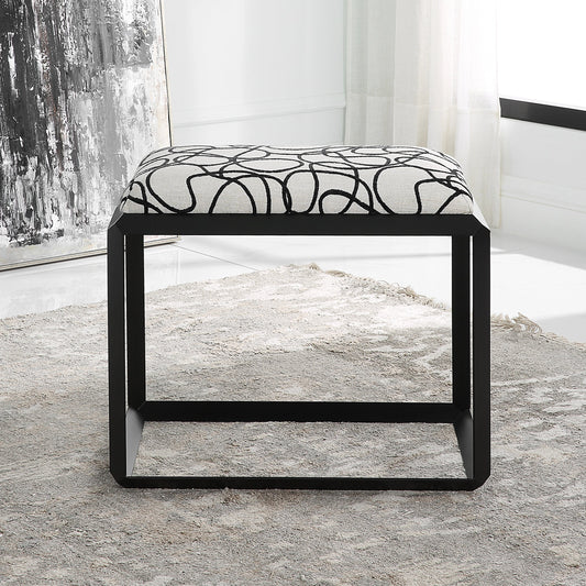 Curls Bench by Uttermost in stone gray and satin black. Made from iron, mdf, polyester, foam in a modern style.