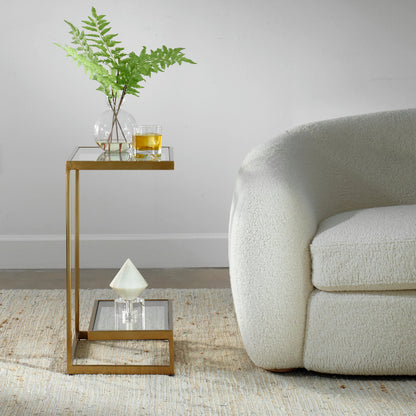 Musing Accent Table by Uttermost in brushed brass. Made from iron, glass in a modern style.