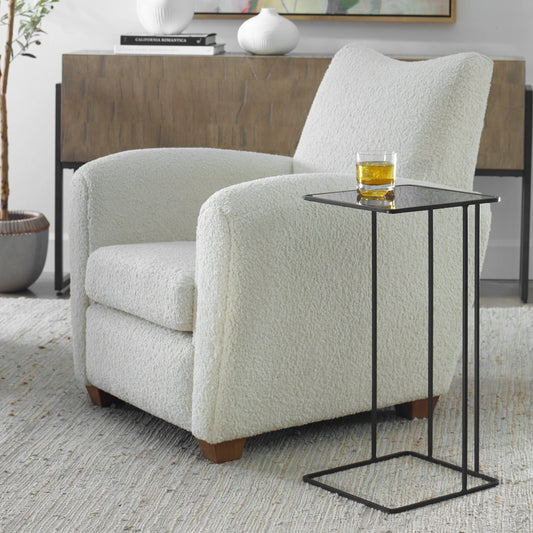 Cadmus Accent Table by Uttermost in black. Made from iron, glass in a modern style.