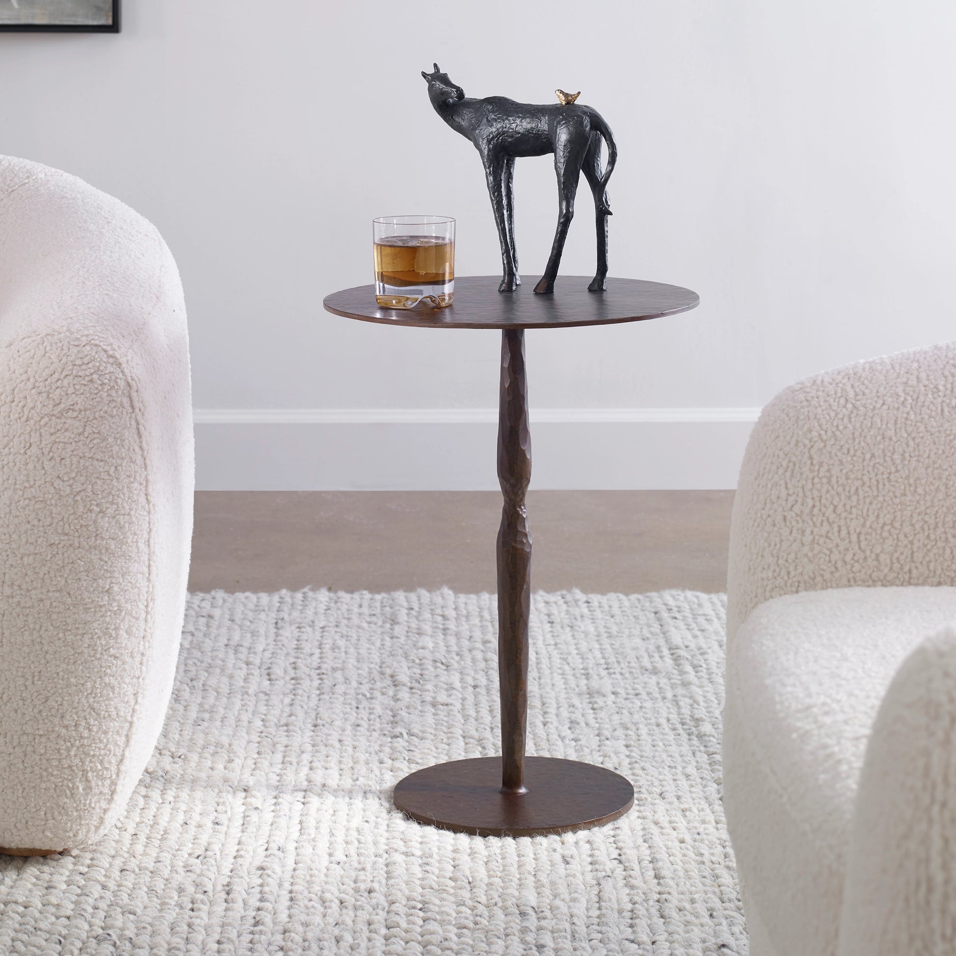 Industria Accent Table by Uttermost in bronze. Made from iron in a modern style.