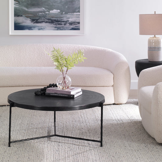 Trellick Coffee Table by Uttermost in black. Made from aluminum, iron in a modern style.