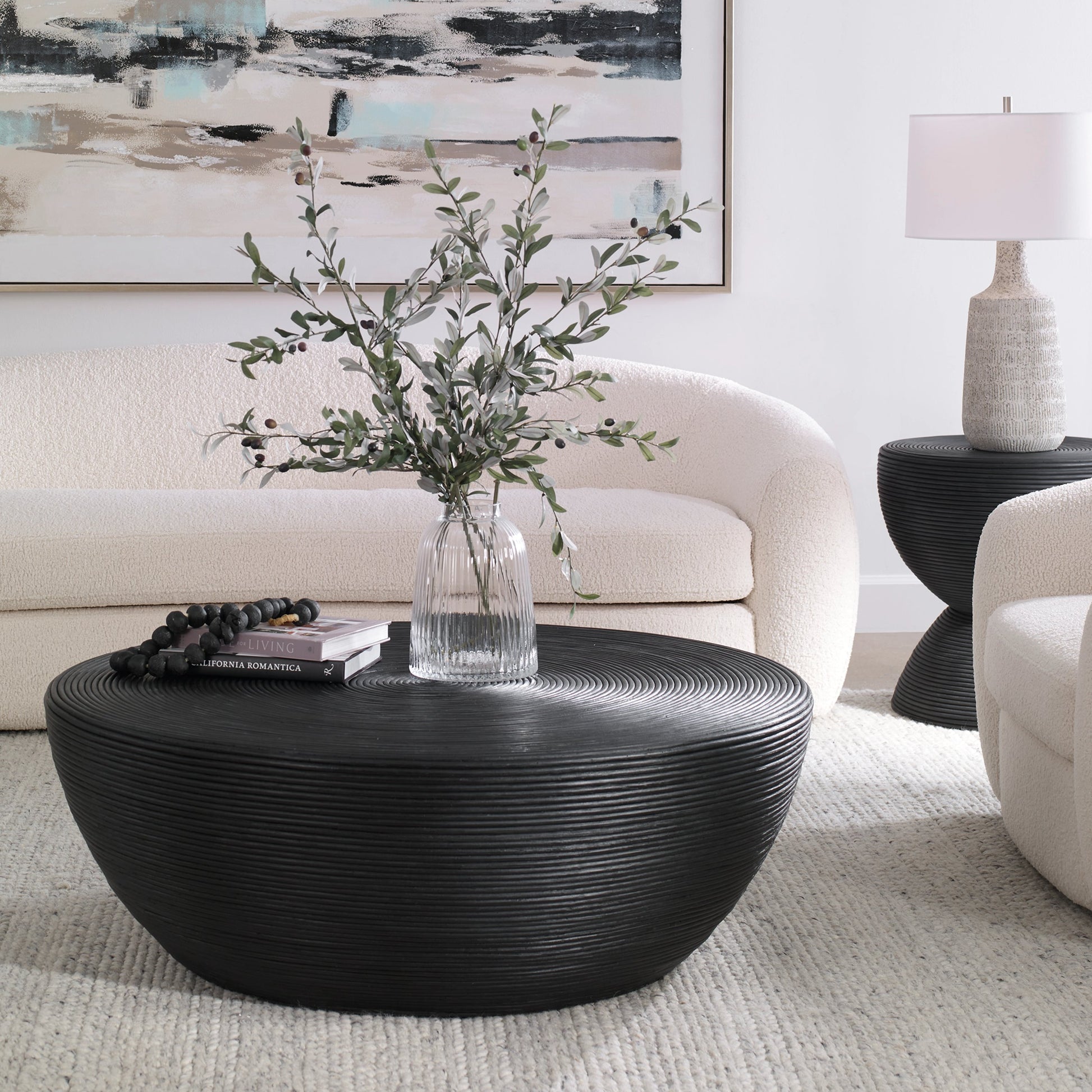 Bongo Coffee Table by Uttermost in black. Made from core with fabric furing in a modern style.