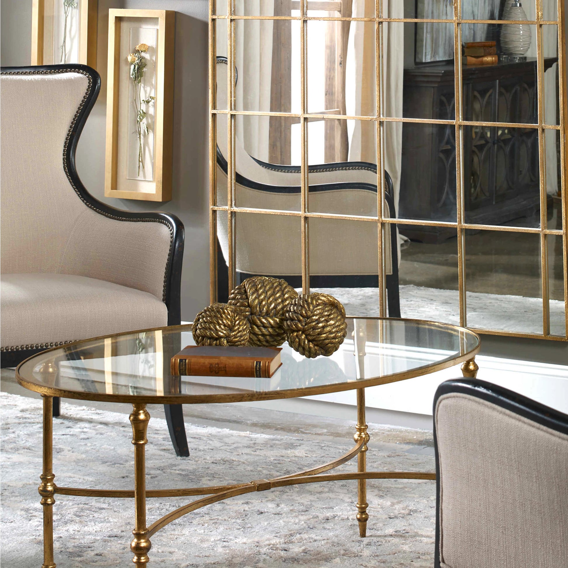 Vitya Glass Coffee Table by Uttermost. Made from metal, tempered glass in a modern style.