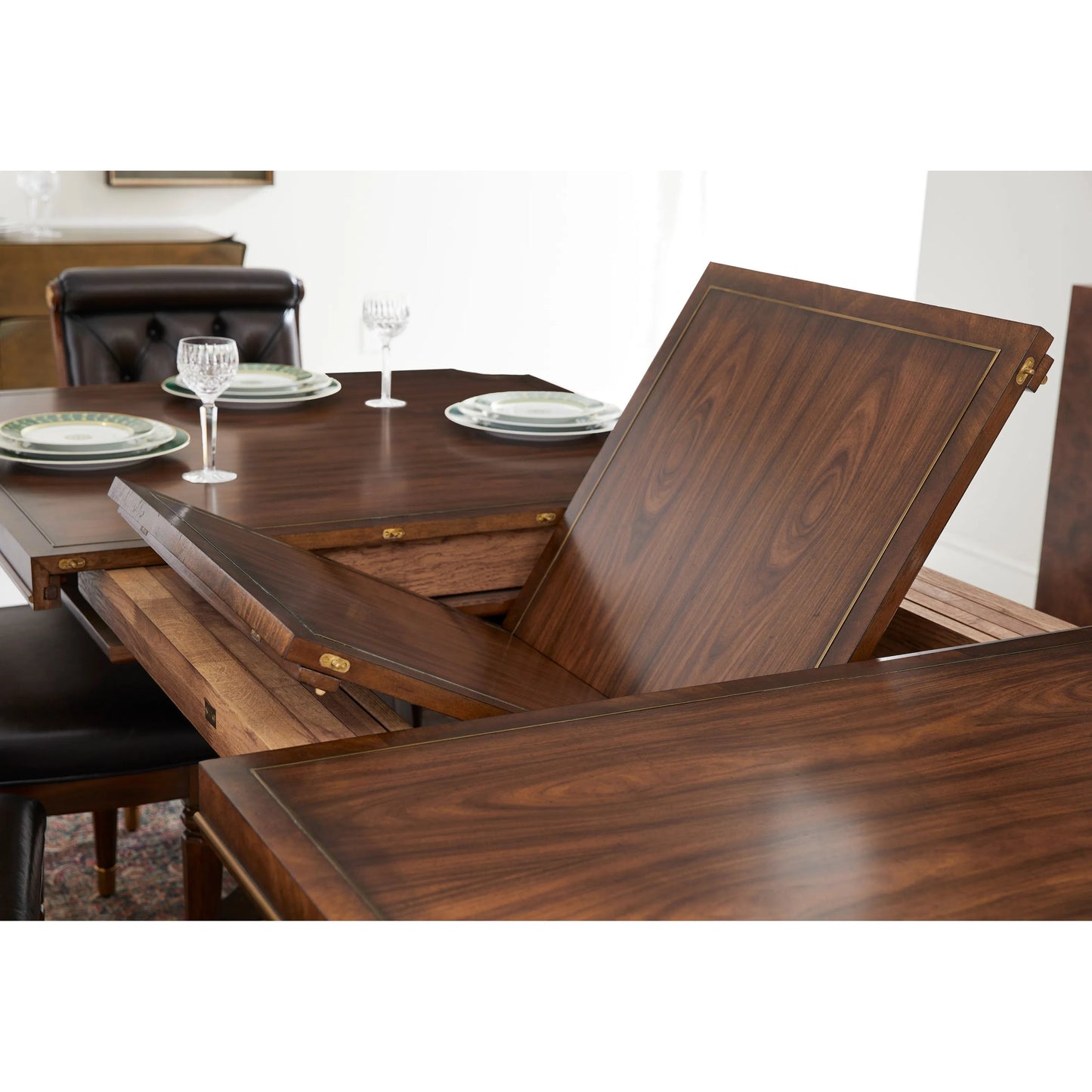 017 SI-2446832 | Lifestyle | Viceroy Rectangular Dining Table by Jonathan Charles in viceroy brown santos. Made from local mahogany, brass, santos rosewood crown veneer in a traditional style.