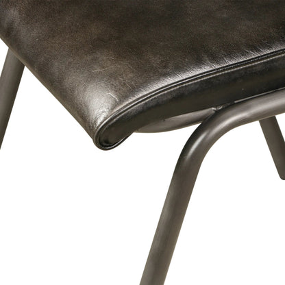 William Dining Chair by World Interiors in black, silver and natural. Made from leather, iron in a unique style.