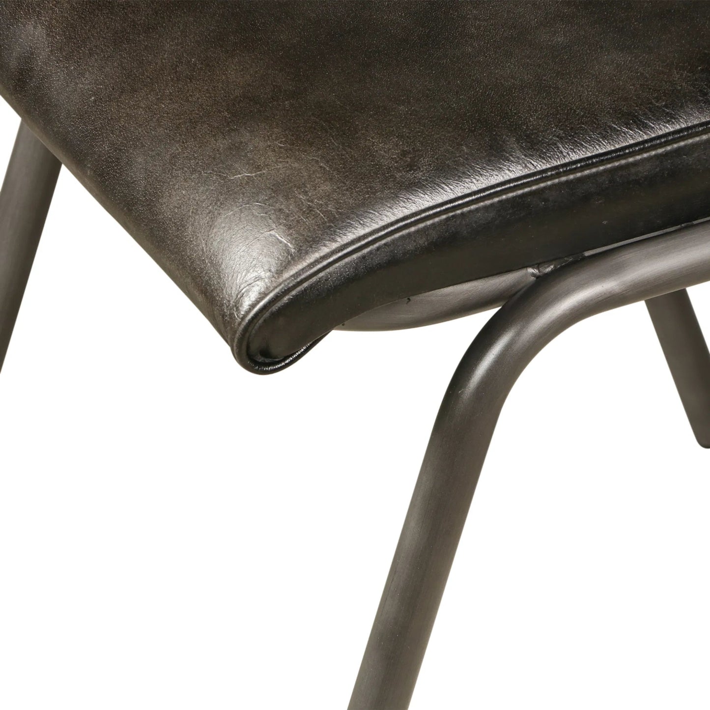 004 SI-2445314 | Closeup | William Dining Chair by World Interiors in black, silver. Made from leather, iron in a unique style.