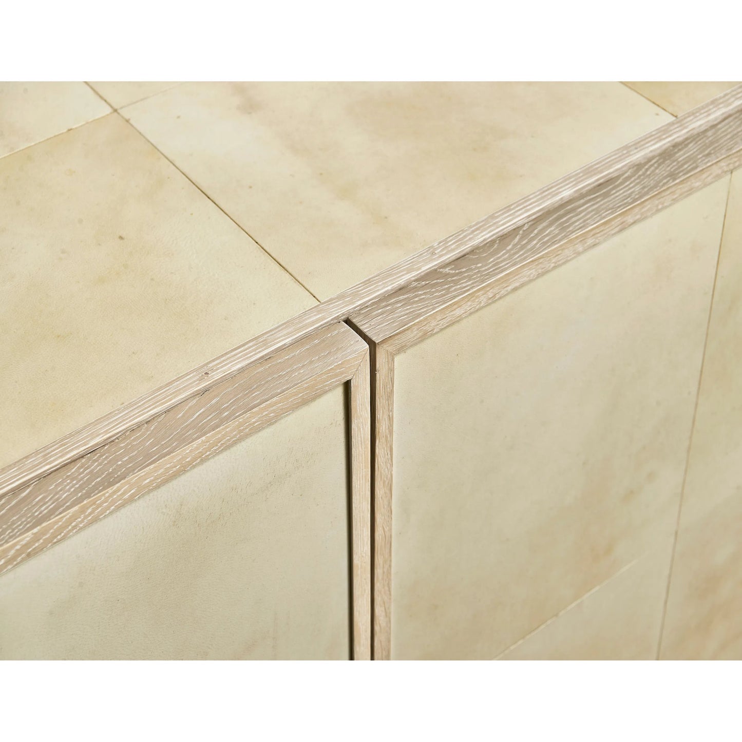 007 SI-2446826 | Closeup | Hydra Entertainment Console by Jonathan Charles in parchment oak. Made from oak, oak veneer, brass, vellum in a transitional style.