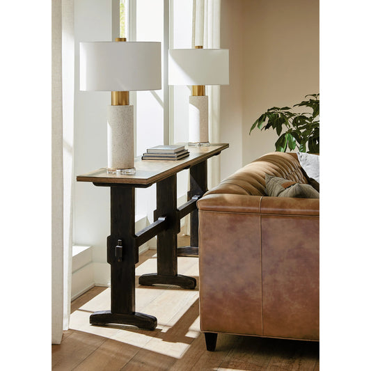 Americana Trestle Console Table by Hooker Furniture in black and molasses finish. Made from oak veneers with solid-wood edge top in a modern style.