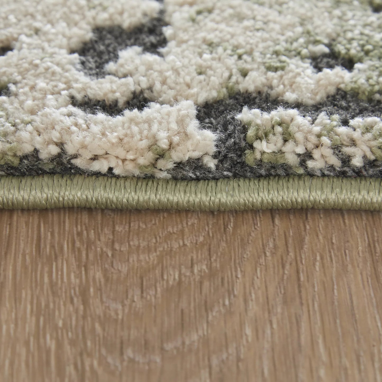 006 SI-2635517,SI-2635518,SI-2635519,SI-2635520,SI-2635521 | Closeup | Gilmore GIL39UNF Rug by Feizy in green, ivory, black. Made from polypropylene in a unique style.