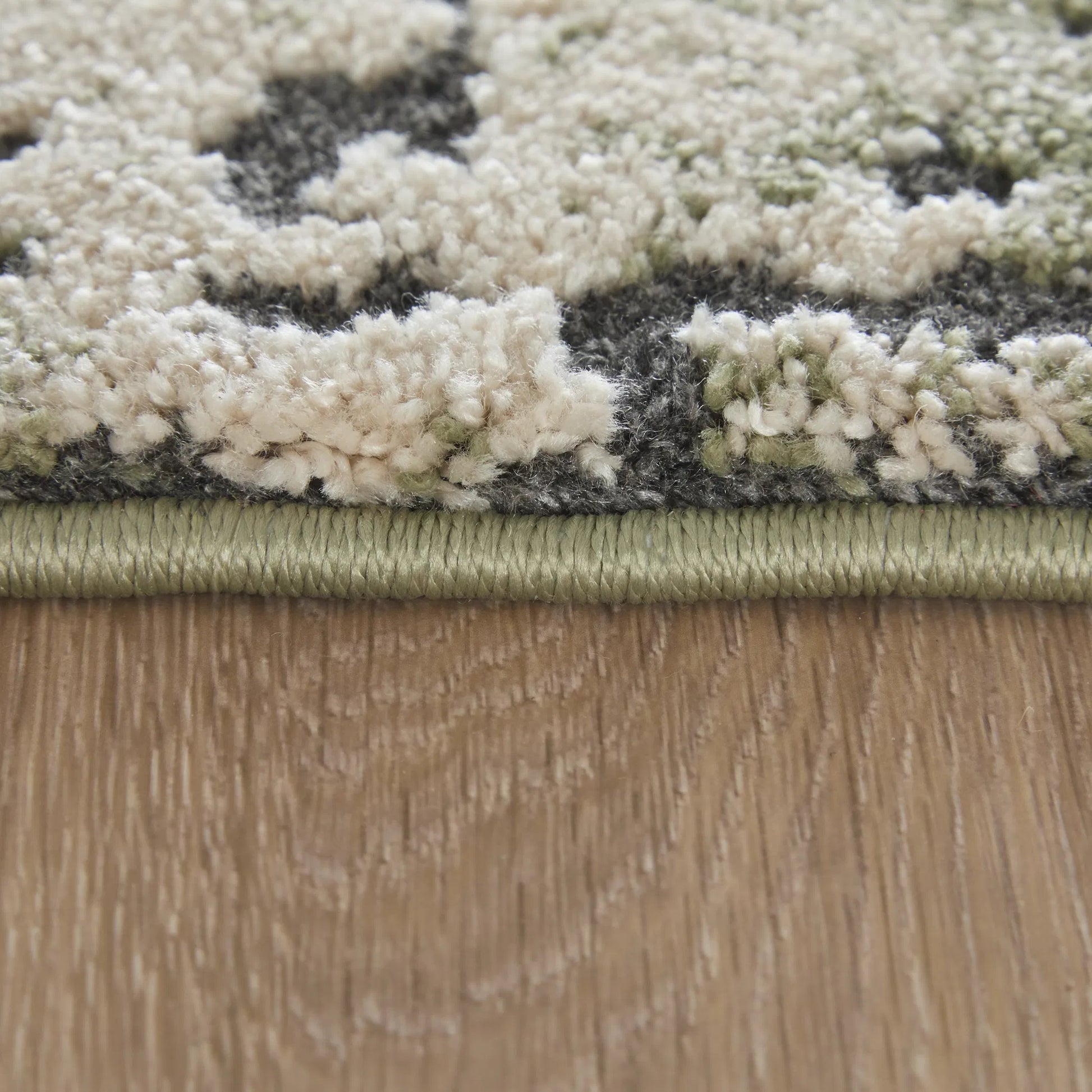 Gilmore GIL39UNF Rug by Feizy in green, ivory, black. Made from polypropylene in a unique style.