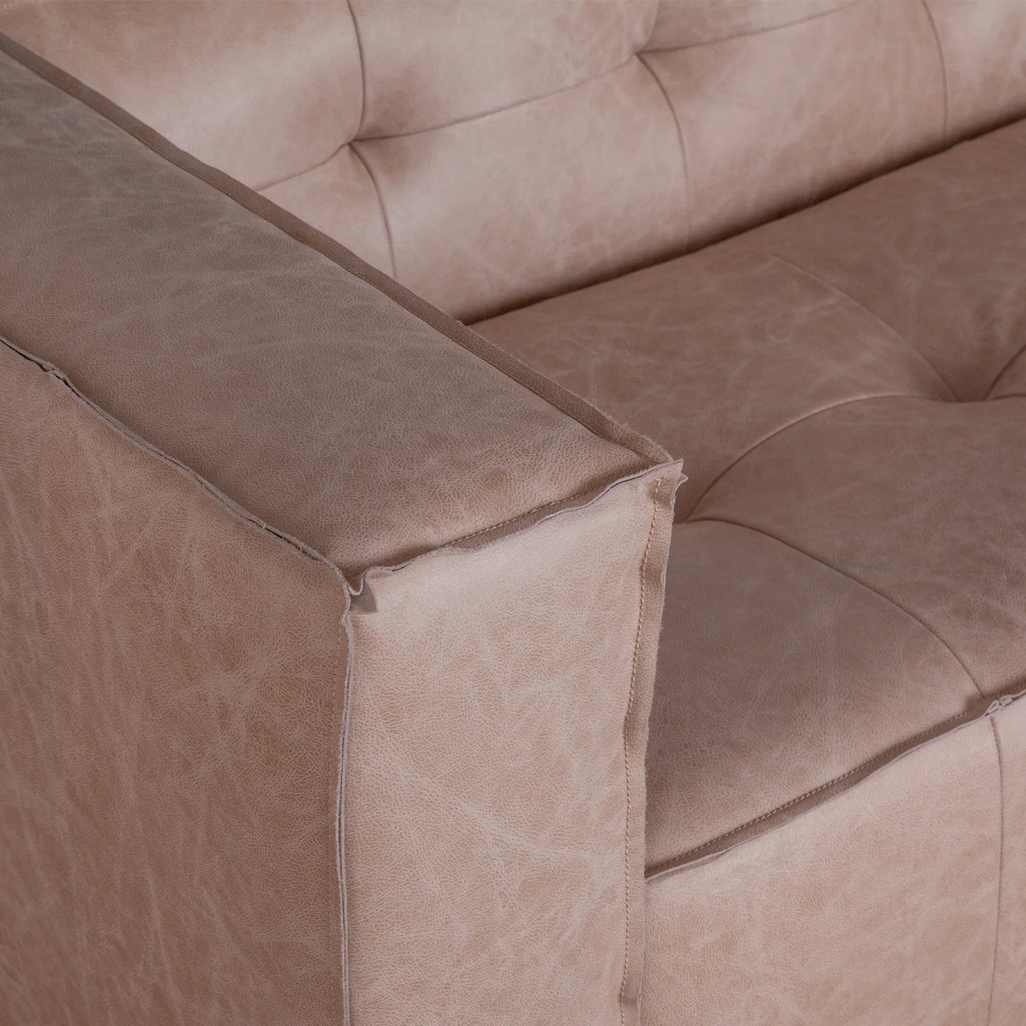 005 SI-2243031 | Closeup | Portia Cream Leather Sofa by World Interiors in white and italian cream. Made from top grain leather in a traditional style.