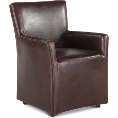 Lily Armchair by World Interiors in brown and distressed. Made from birch wood, bi-cast leather in a transitional style.