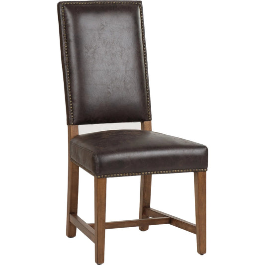 Dani Dining Chair by World Interiors in earth. Made from top grain pig leather, birch wood, metal, foam in a traditional style.