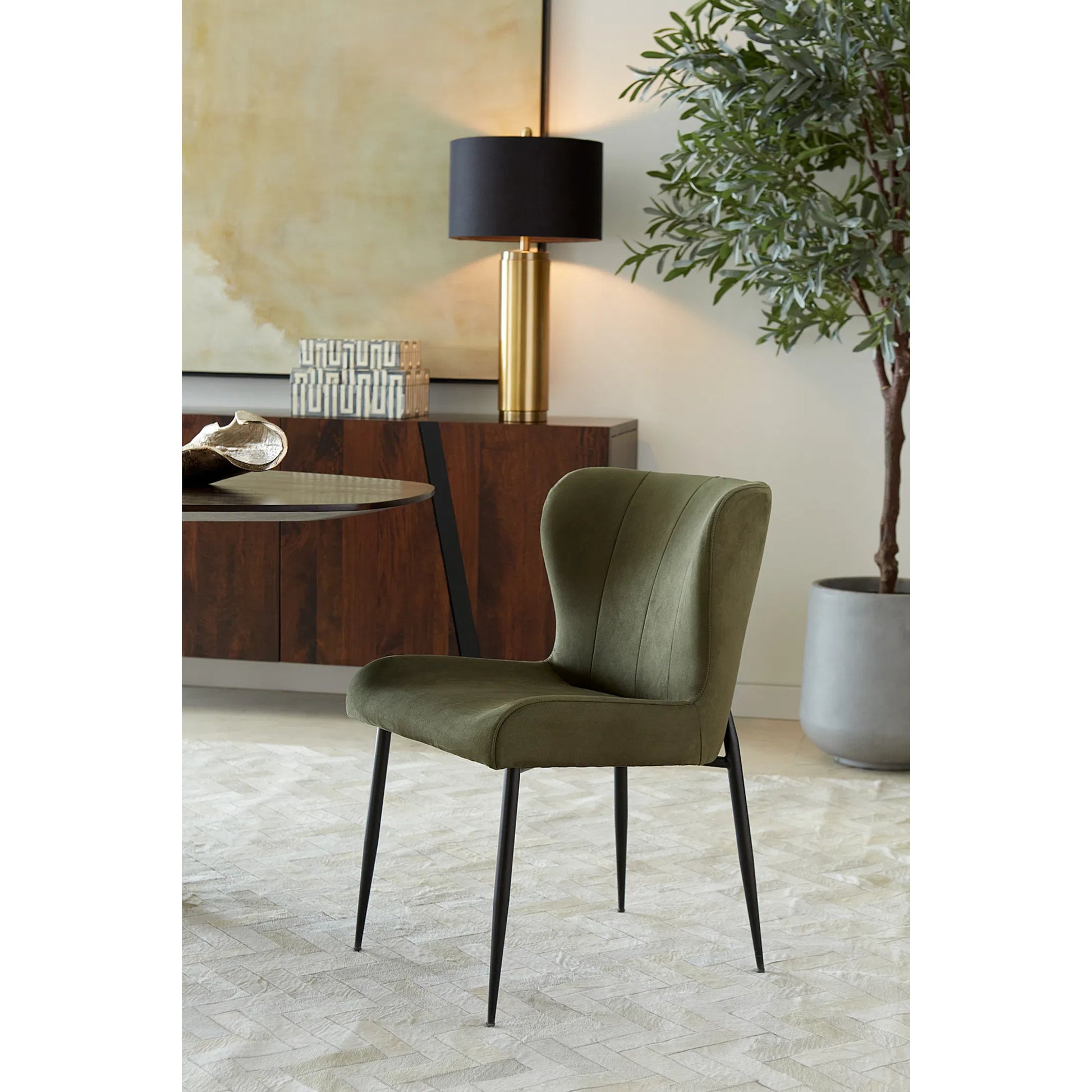 Isabella Dining Chair by World Interiors in forest green. Made from iron, suede in a modern style.