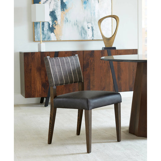 Lila Dining Chair by World Interiors in black and dark walnut. Made from wood, leather in a unique style.