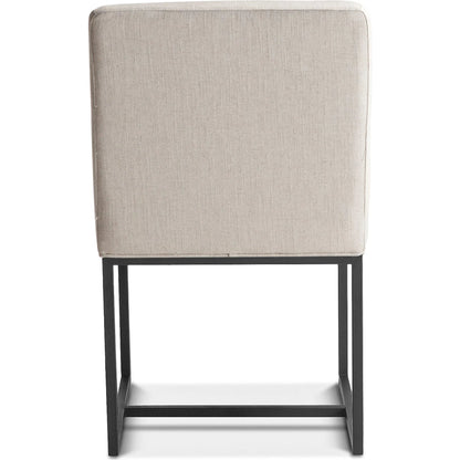 Rebel Dining Chair by World Interiors in off-white and antique zinc. Made from linen, cotton, polyester blend fabric, foam, iron, birch wood in a unique style.