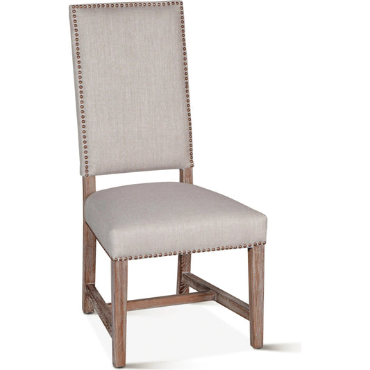 Dani High Back Dining Chair by World Interiors in gray wash. Made from linen, foam, wood, iron studs in a modern style.
