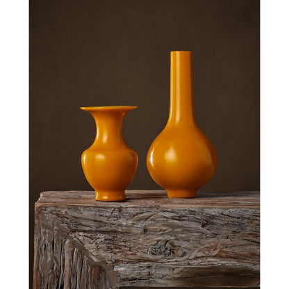 Imperial Yellow Peking Long Neck Vase by Currey and Company in imperial yellow. Made from glass in a modern style.