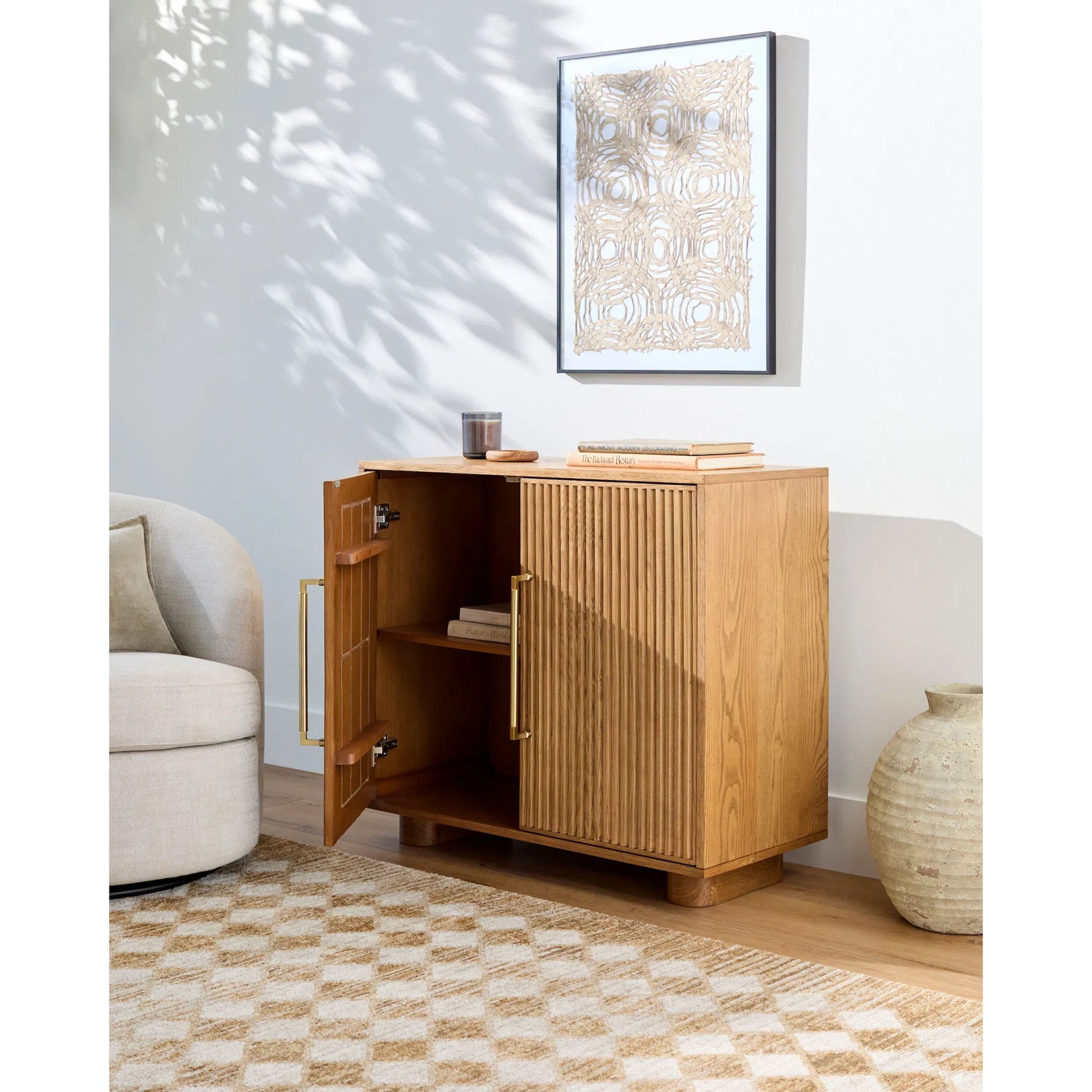 Charlye Cabinet by Livabliss in top: brown; base: brown and natural, lacquered. Made from ash wood veneer, plywood, rubber wood in a transitional style.
