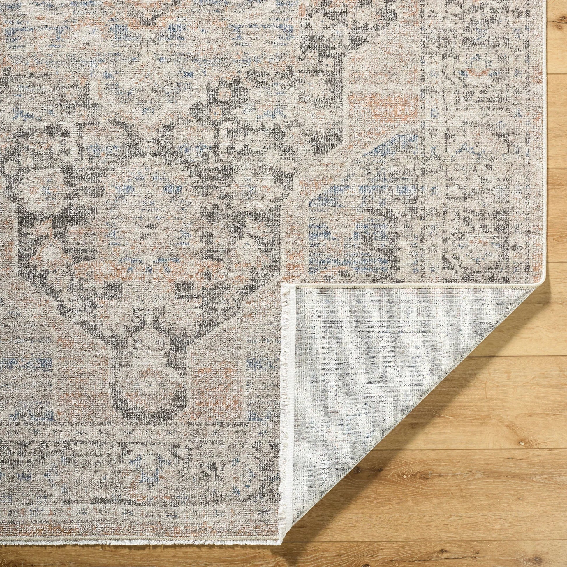 Maria Elena GADA-2303 Rug by Galey Alix x Livabliss in dark brown, oatmeal, brown, dark blue, ivory. Made from polyester in a unique style.