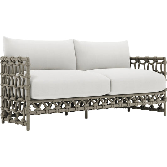 Nodi Outdoor Sofa by Bernhardt in white. Made from fabric in a unique style.