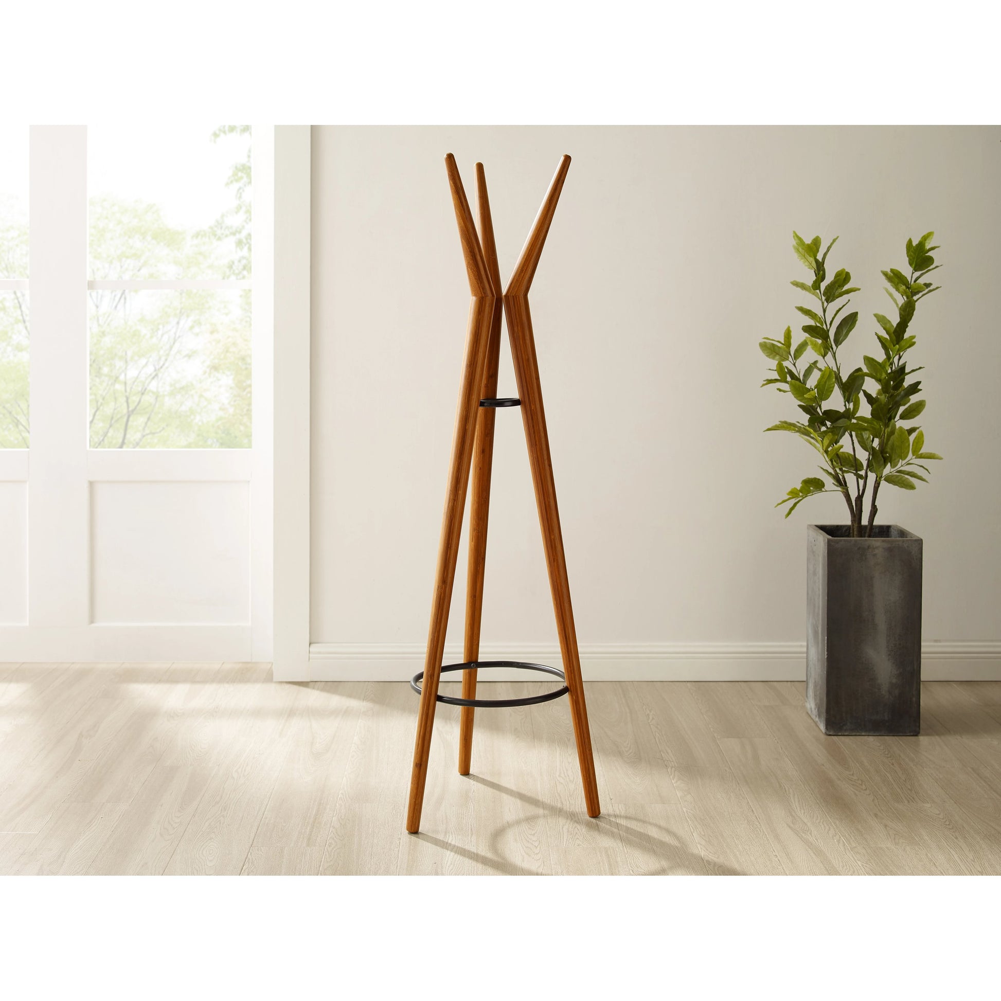 Spire Coat Tree by Greenington in amber. Made from solid moso bamboo in a modern style.