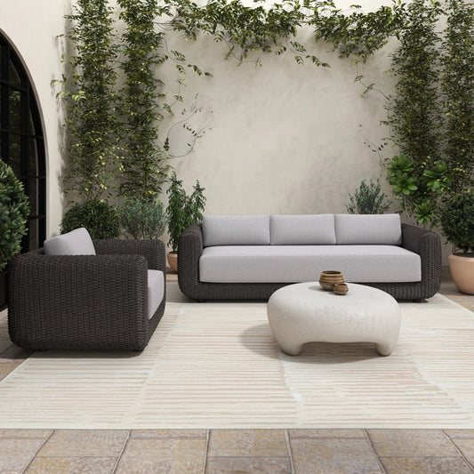 Soma Outdoor Sofa by Moe's Home Collection. Made from wicker, aluminum frame, 100% olefin fabric, quick dry foam cushion in a unique style.