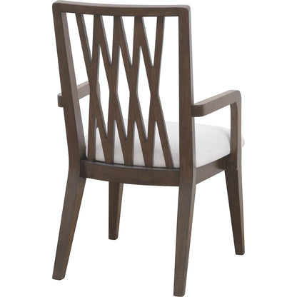 Asher Park Wood Back Arm Chair by Pulaski Furniture in piano brown. Made from eucalyptus veneers in a unique style.