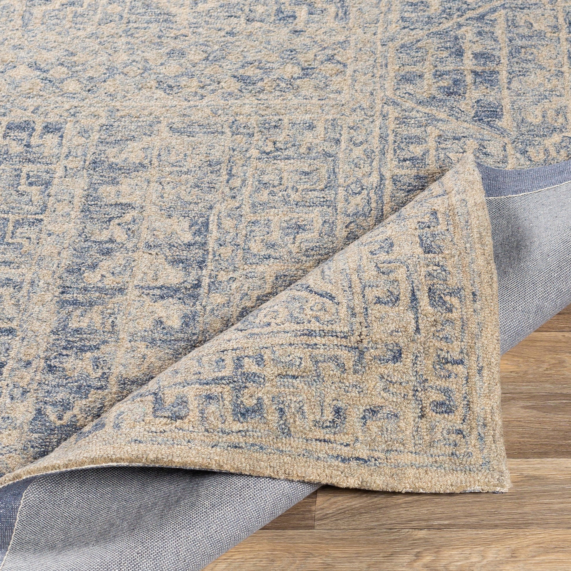 Granada Rug - 24532 by Livabliss in navy, light blue, ivory. Made from 100% wool in a unique style.