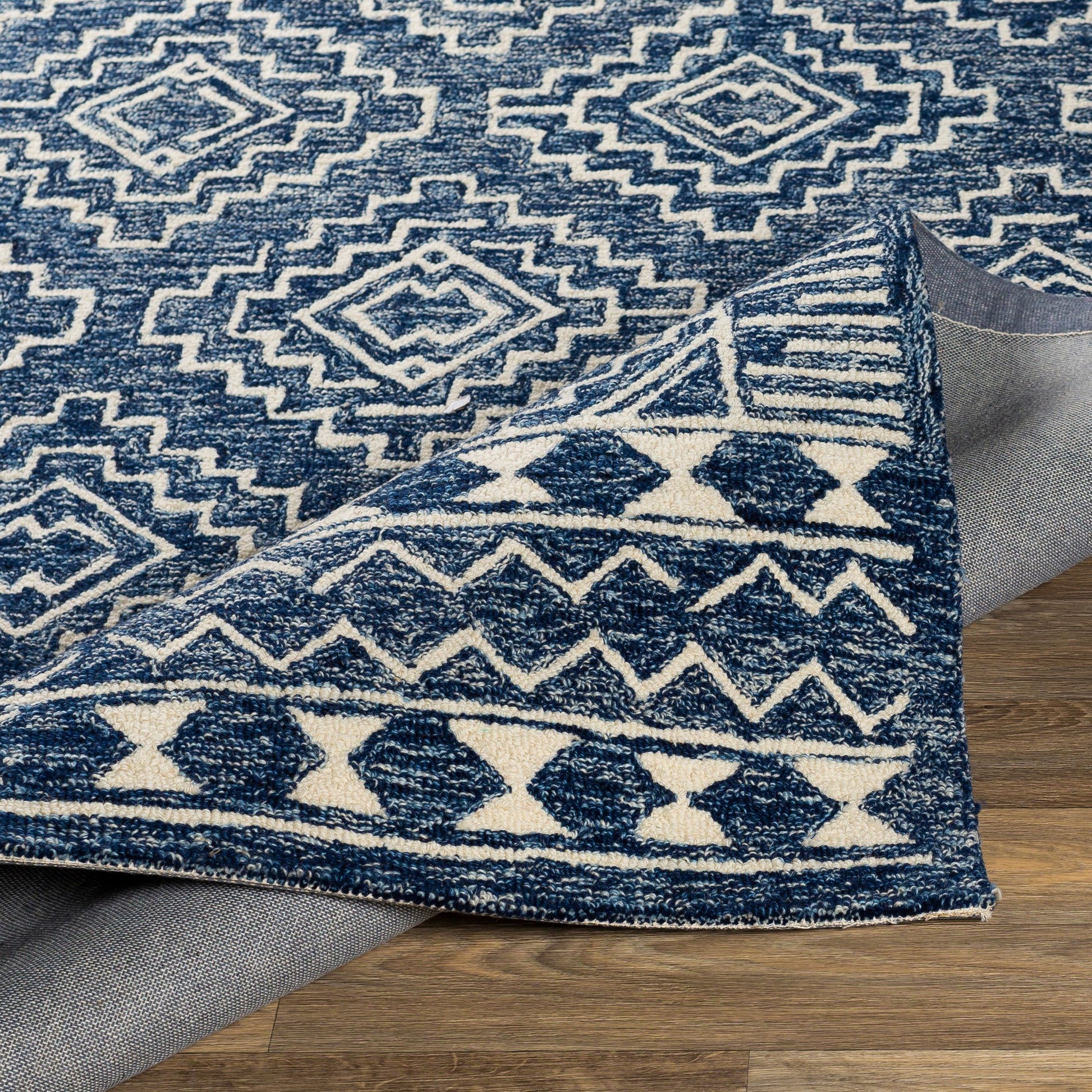 Granada Rug - 24536 by Livabliss in navy, light blue, beige. Made from 100% wool in a unique style.