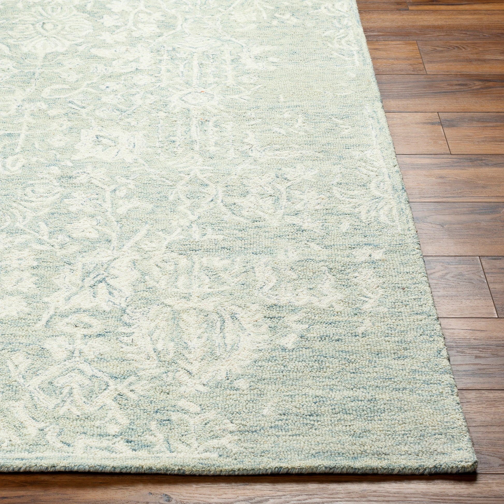 Granada Rug - 29983 by Livabliss in teal, light green, cream. Made from 100% wool in a unique style.