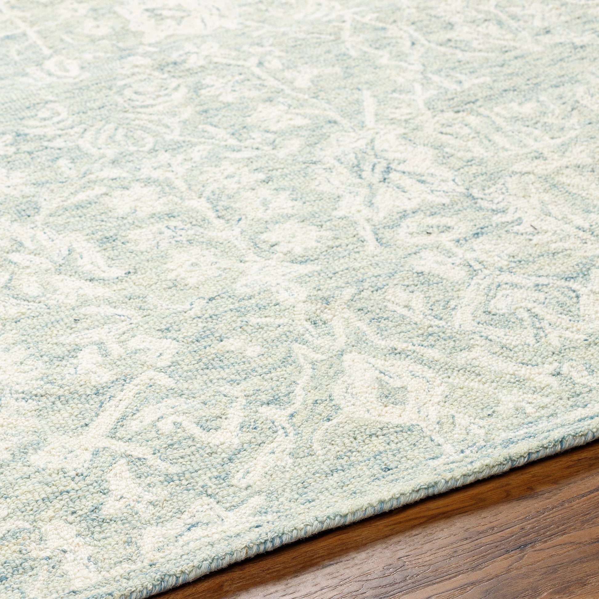 Granada Rug - 29983 by Livabliss in teal, light green, cream. Made from 100% wool in a unique style.