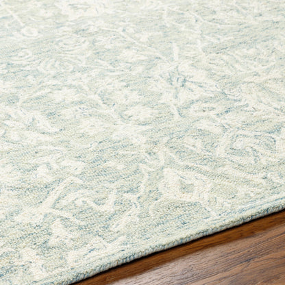 Granada Rug - 29983 by Livabliss in teal, light green, cream. Made from 100% wool in a unique style.