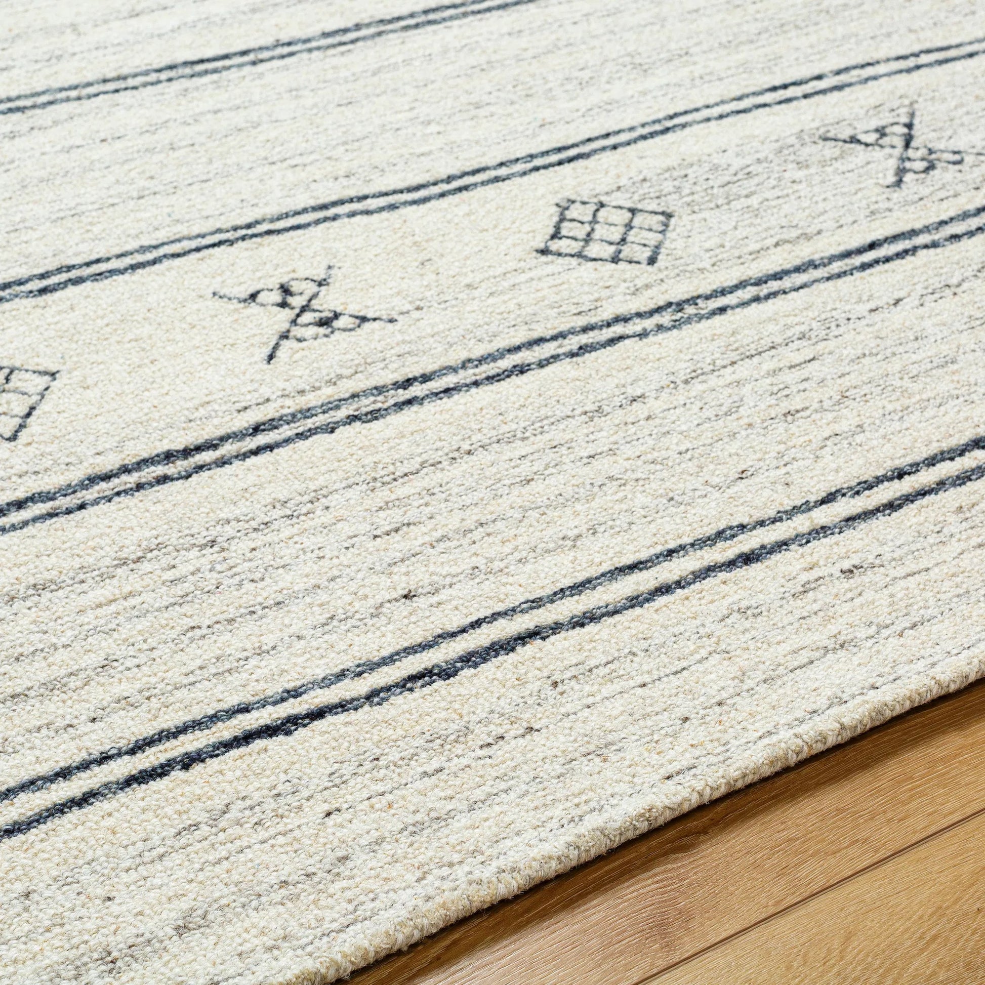 Granada Rug - 32650 by Livabliss in cream, black, charcoal. Made from main: 100% wool in a unique style.