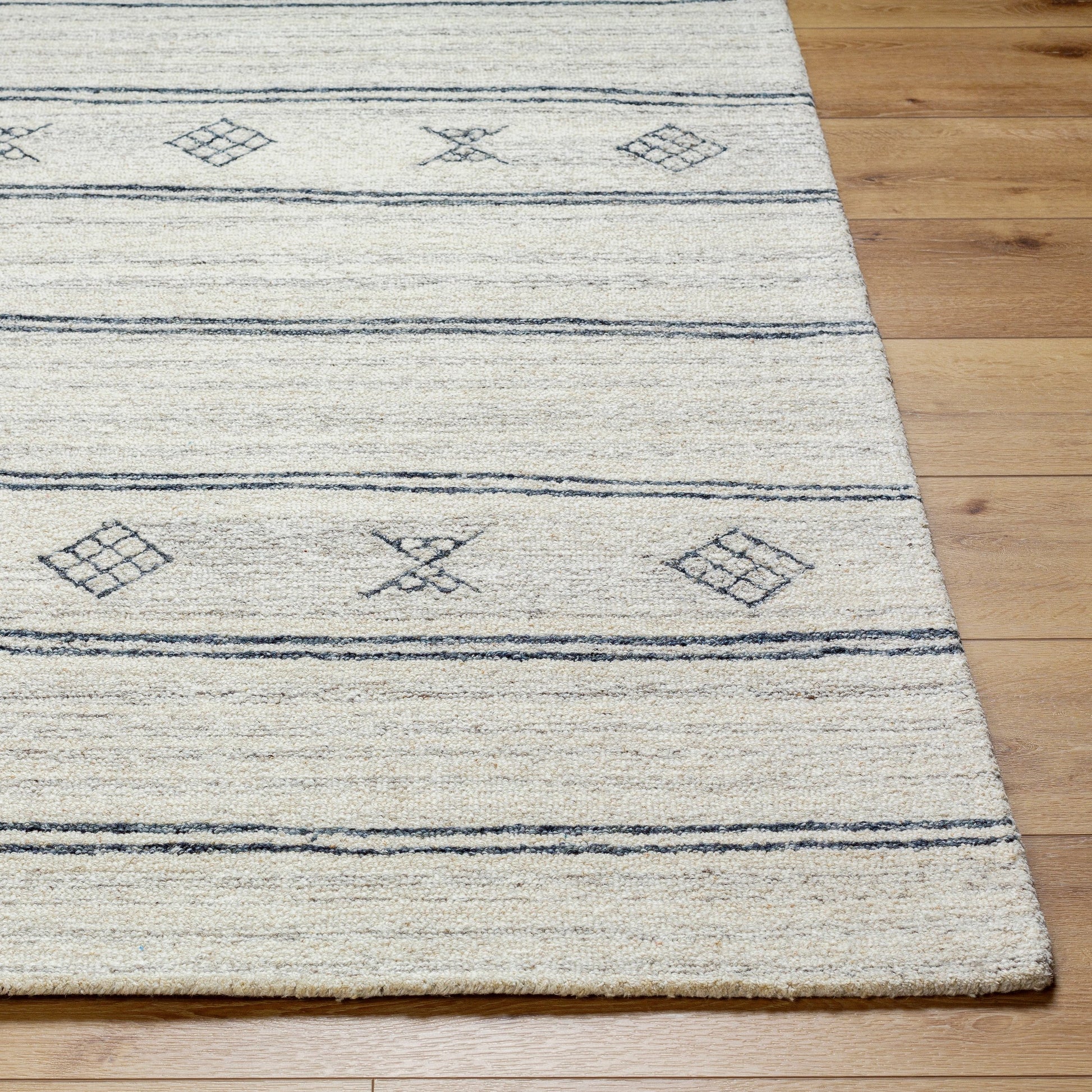 Granada Rug - 32650 by Livabliss in cream, black, charcoal. Made from main: 100% wool in a unique style.