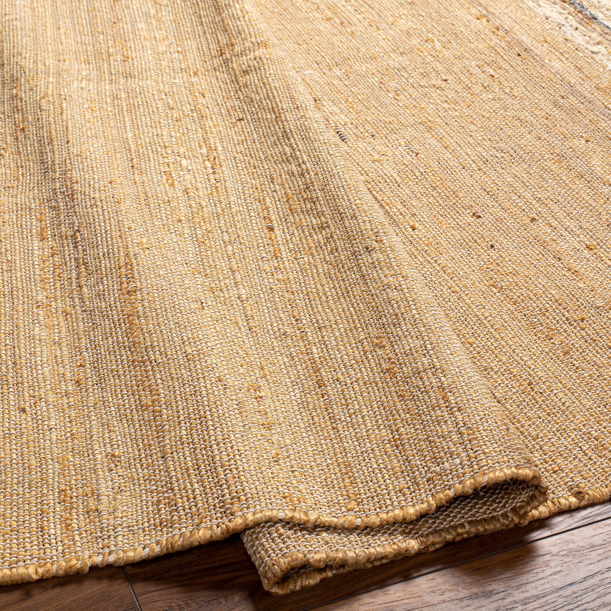 Geneva GNV-2300 Rug by Surya in black, charcoal, peach, light beige. Made from 60% jute, 40% wool in a unique style.