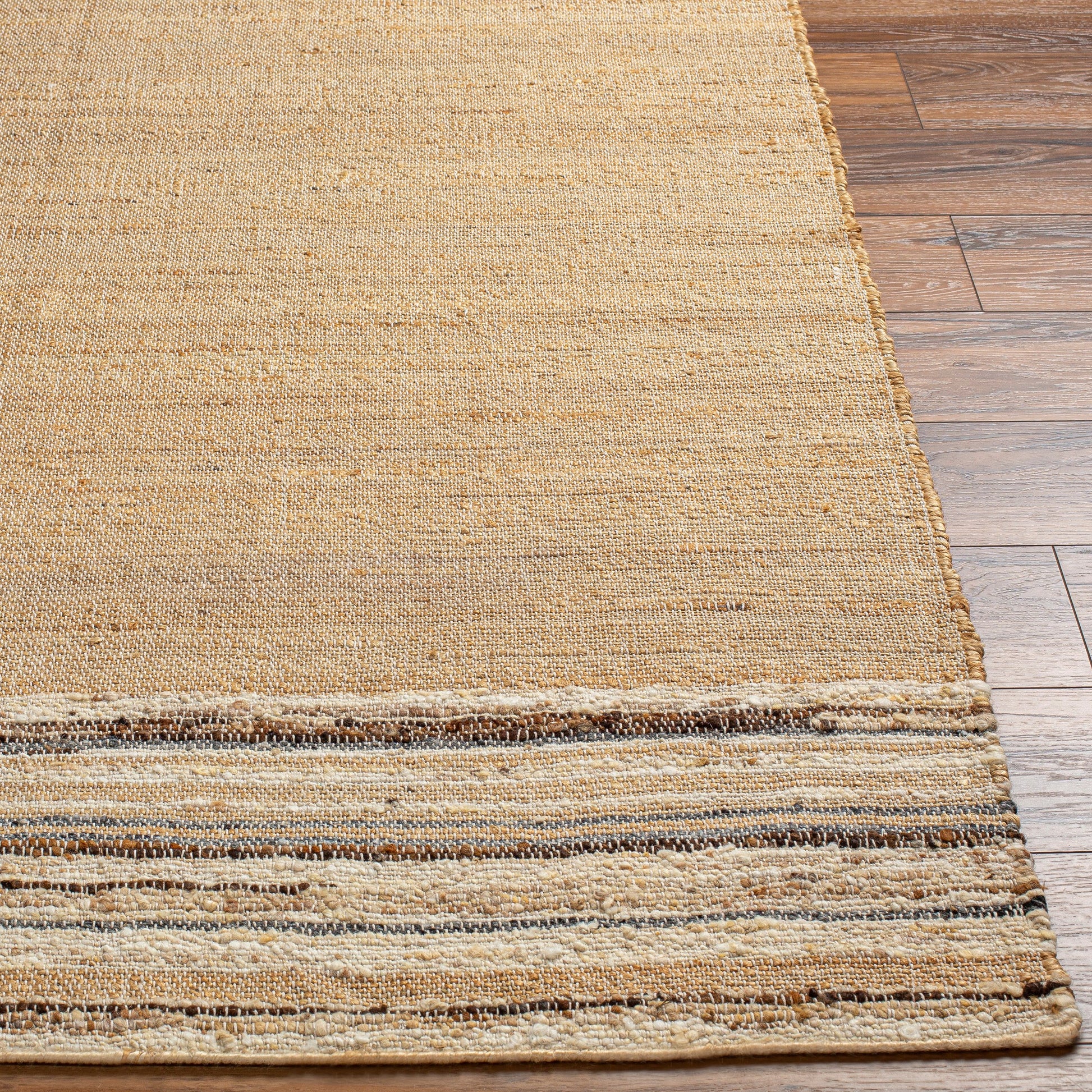 Geneva GNV-2300 Rug by Surya in black, charcoal, peach, light beige. Made from 60% jute, 40% wool in a unique style.