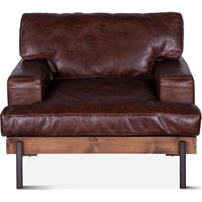 Chiavari Industrial Dover Brown Leather Armchair by World Interiors in geisha brown, antique zinc, medium walnut. Made from leather, iron, oak in a transitional style.