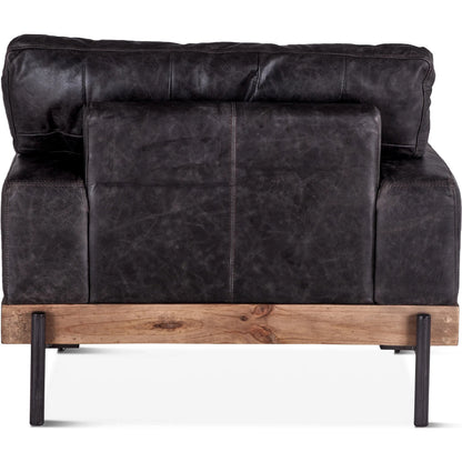 Chiavari Armchair by World Interiors in brown and distressed, antique zinc. Made from leather, iron, oak in a rustic style.